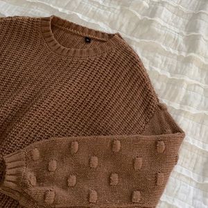 Brown sweater